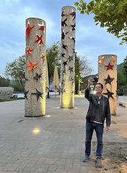 Martin taking a photo of Ralf taking a selfie at Schengen Monument